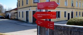 Signposts at small bridge in Ptuj